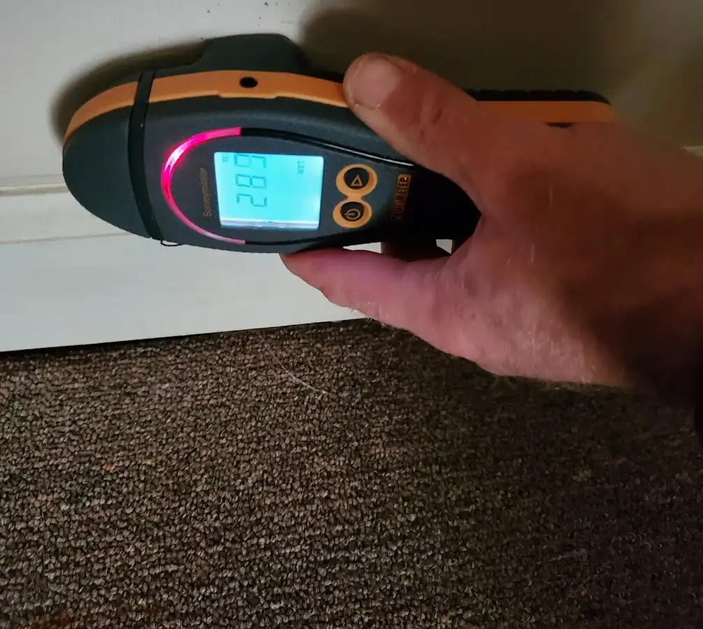 Moisture detection at baseboard during Burst Pipe Cleanup in La Puente